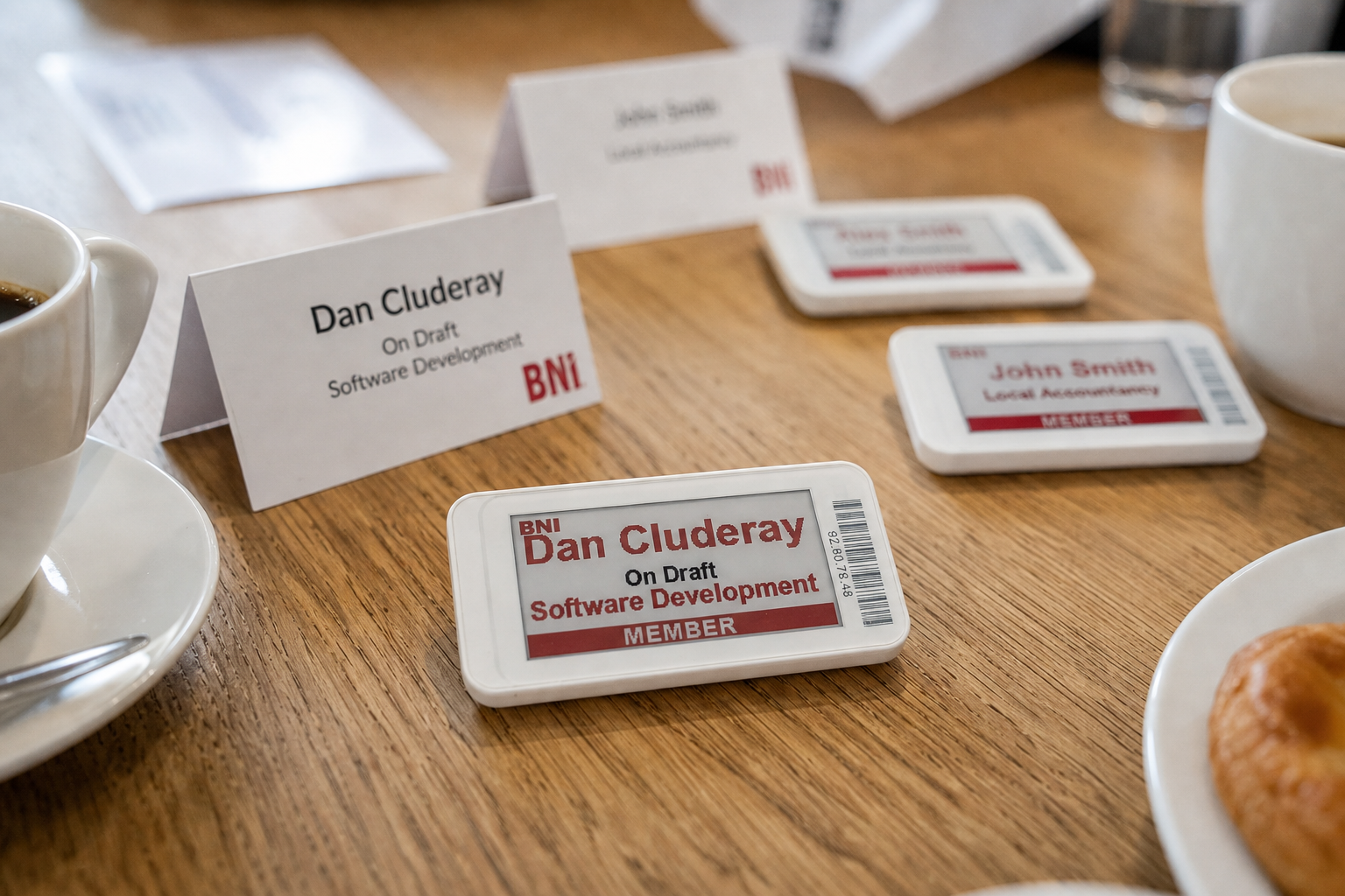 E-ink name badges on a conference registration table